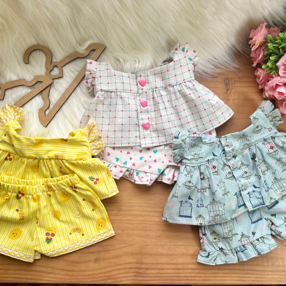 Conjunto manga e shorts com pregas